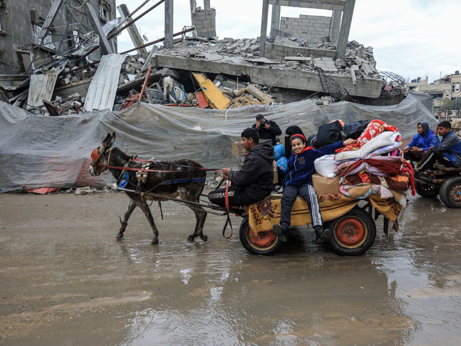 Images: Palestinians flee Nuseirat refugee camp as soon as once more amid assaults | Israel Struggle on Gaza Information