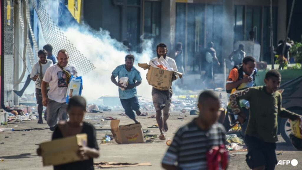 Papua New Guinea vows crackdown after 15 killed in riots