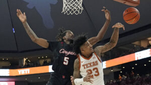 Texas suffers powerful house extra time loss to No. 4 Houston