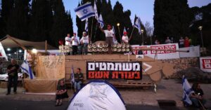 Exterior Israel’s Parliament, Protesters Clarify Why Netanyahu Should Go