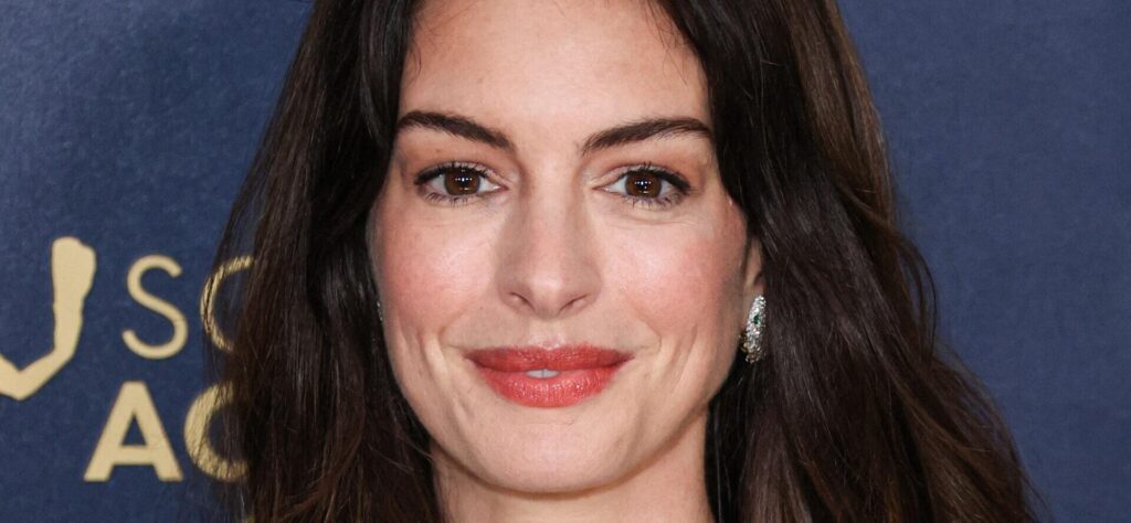 Anne Hathaway Stuns As A Ghostly Statue Of Liberty for Halloween
