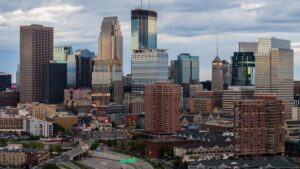 At the least three lifeless in Minneapolis taking pictures, together with police officer