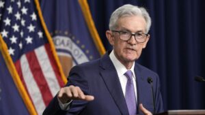 Powell says Fed will lower charges when prepared, no matter political calendar