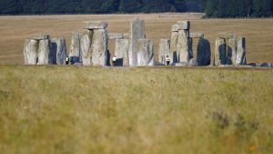 Two local weather activists charged with spraying paint on UK’s Stonehenge
