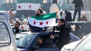 Again in Damascus, insurgent chief assured of post-Assad unity