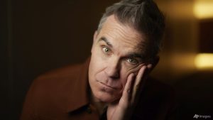 Robbie Williams: ‘One thing about this matrix-bending, washing-machine fame that’s deeply unhealthy’
