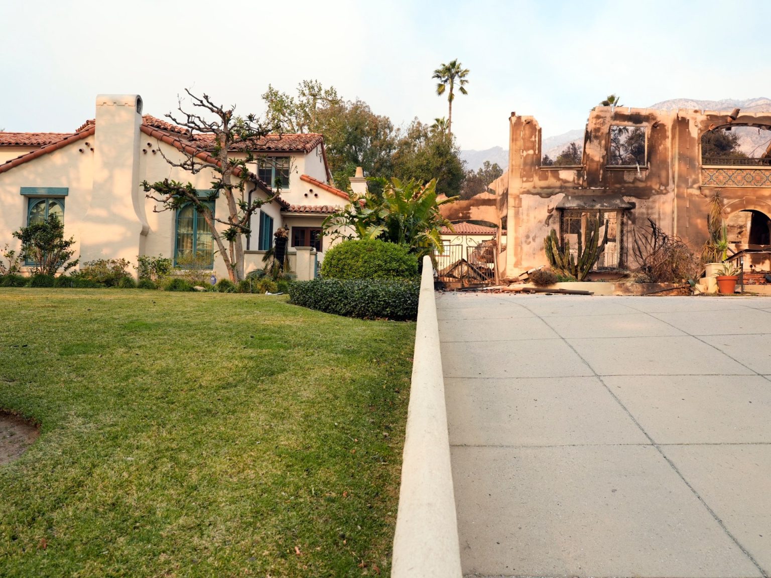 In scorched neighbourhoods, just a few Los Angeles properties stand untouched | Local weather Information