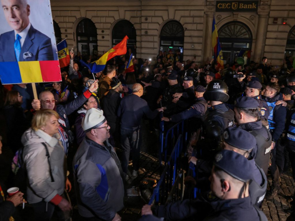 Romania’s far-right candidate Georgescu barred from Might presidential vote | Elections Information Romania’s far-right candidate Georgescu barred from Might presidential vote | Elections Information