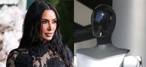 Kim Kardashian Underneath Fireplace For Intimate Pose With Tesla Robotic