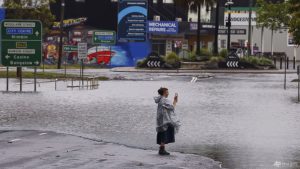 Floods hit japanese Australia, 200,000 properties blacked out