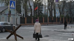 China urges residents to keep away from conflict zones after Kyiv captures two nationals