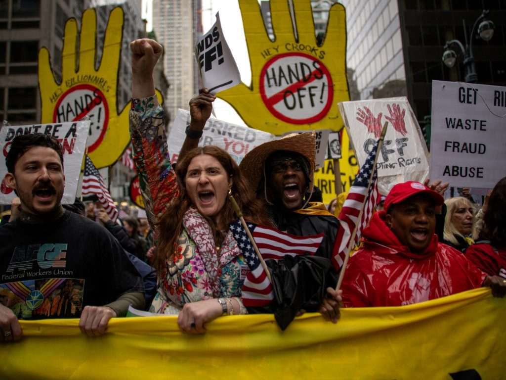 ‘Arms Off’ protesters rally throughout US to oppose Trump’s insurance policies | Donald Trump Information