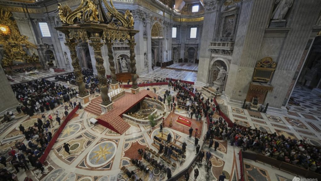 1000’s collect for second day to view Pope Francis