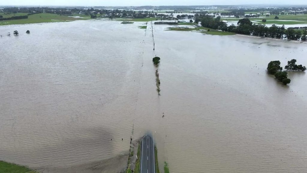 Flood victims stranded on roofs as downpours lash japanese Australia
