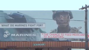 Marine Corps Billboard Defaced By Professional-Unlawful Group
